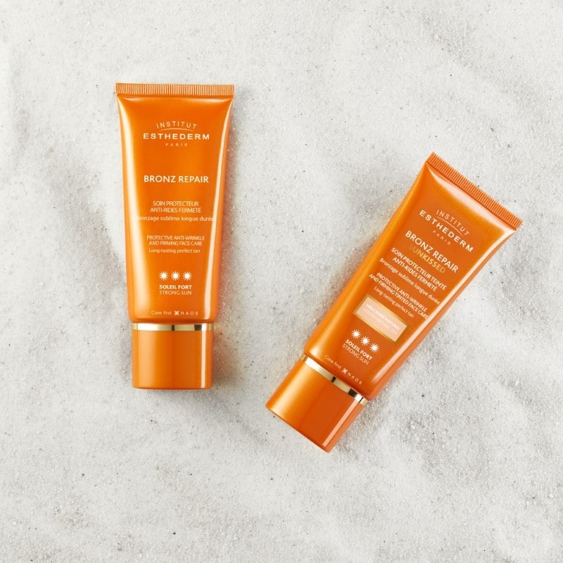 Institut Esthederm Bronz Repair pret-grumbu saules aizsargkrēms vidējai saules intensitātei 50 ml
